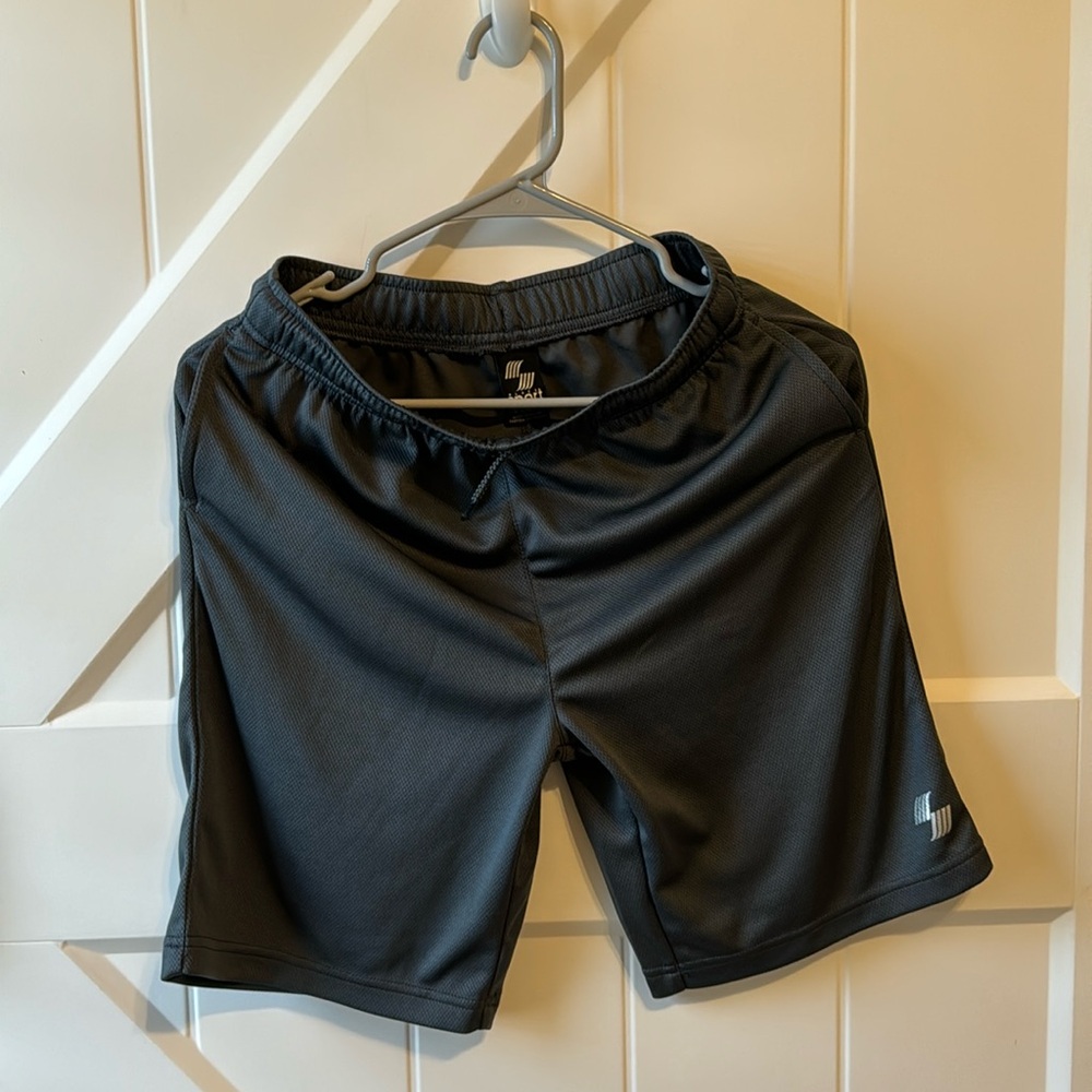 New never used boys shorts size L 10/12